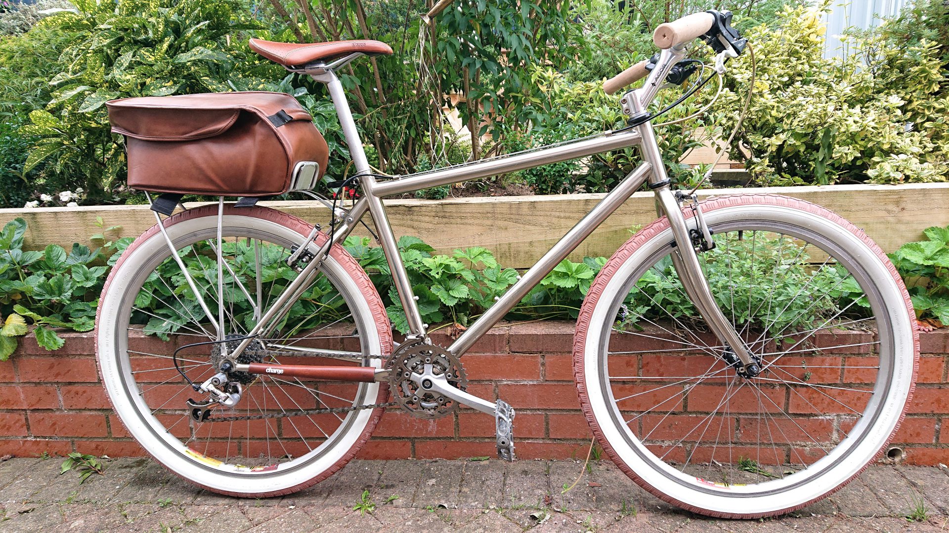 Merlin TDB bike with brown and silver accessories